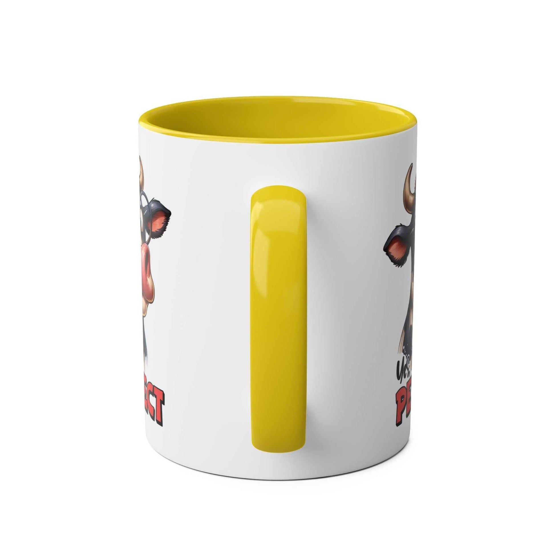 Yellow-handled "I Am Perfect Coffee Mug" with fun cow design and glossy finish.