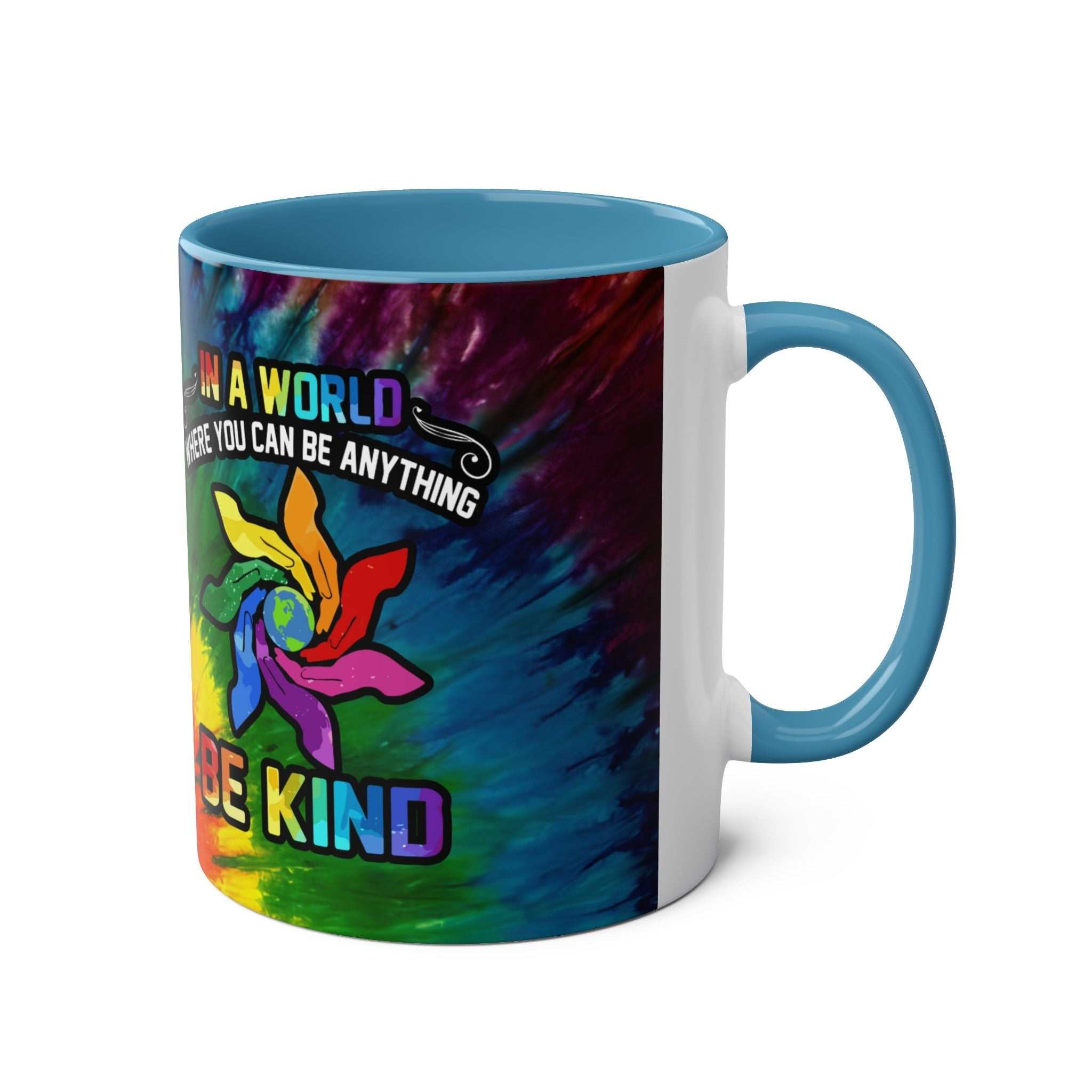 LGBTQ+ Pride mug with vibrant rainbow design and "Be Kind" message, 11oz ceramic, glossy finish.