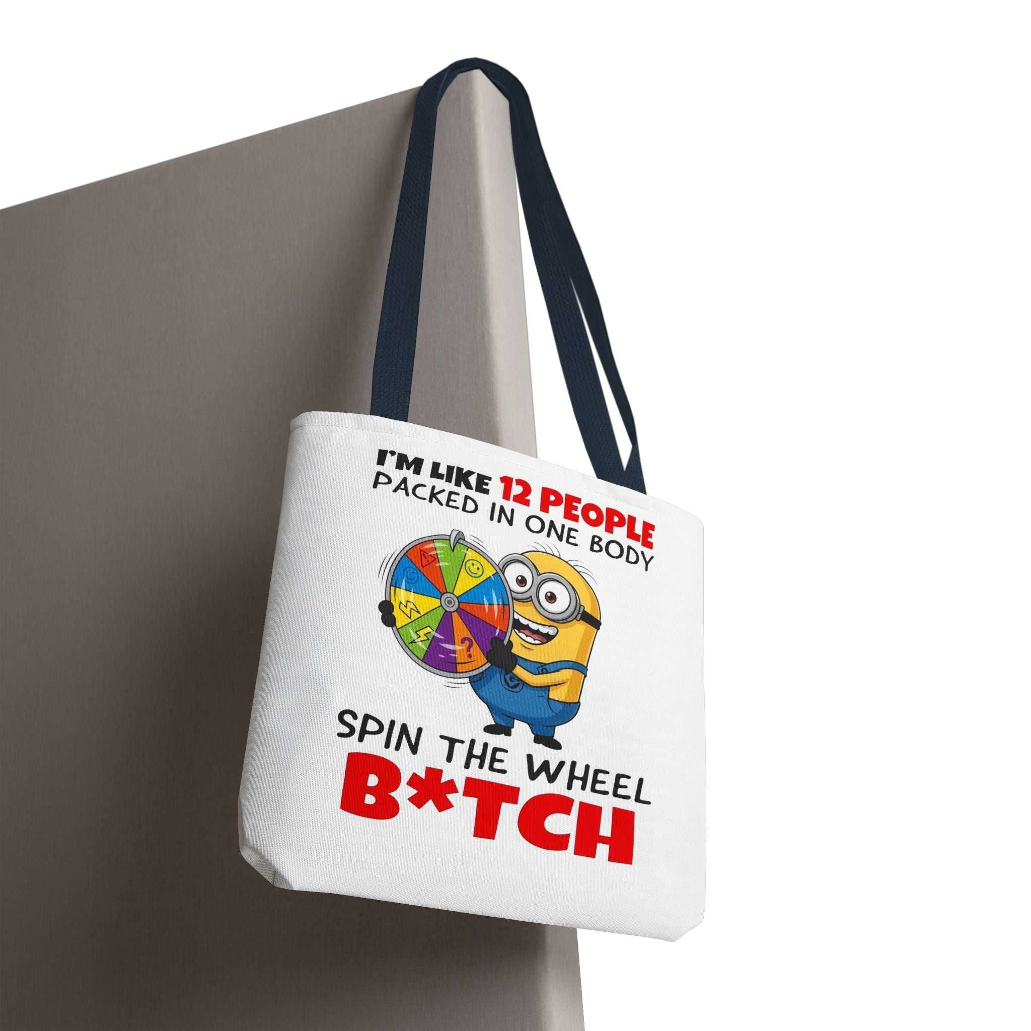 Funny Minion tote bag with cheeky print, durable polyester, and colorful handles for everyday use