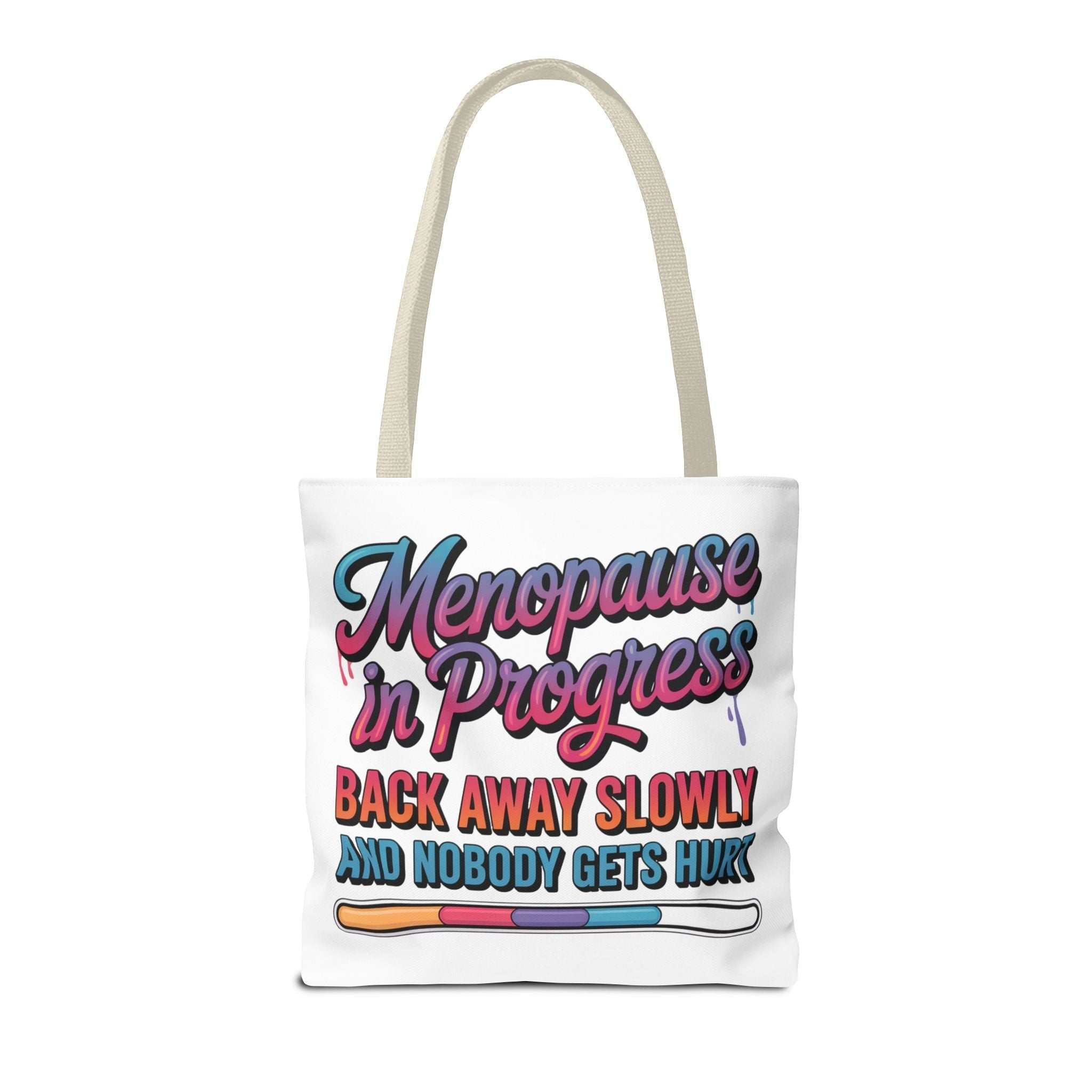 Menopause in Progress tote bag with cheeky design, durable spun polyester, and multiple handle color options