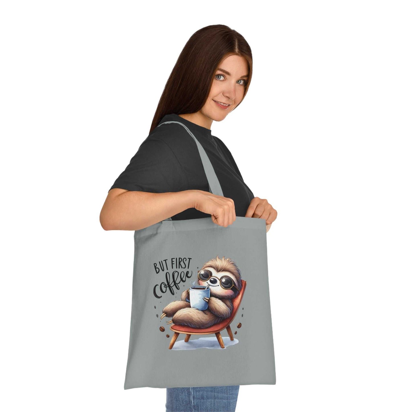 Cotton tote bag with a cute sloth design, perfect for essentials.