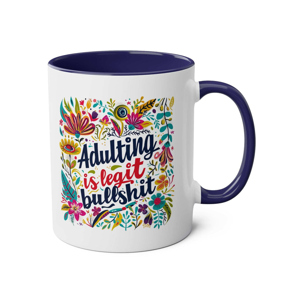 Colorful "Adulting Is Bullshit" coffee mug with floral design and glossy finish.