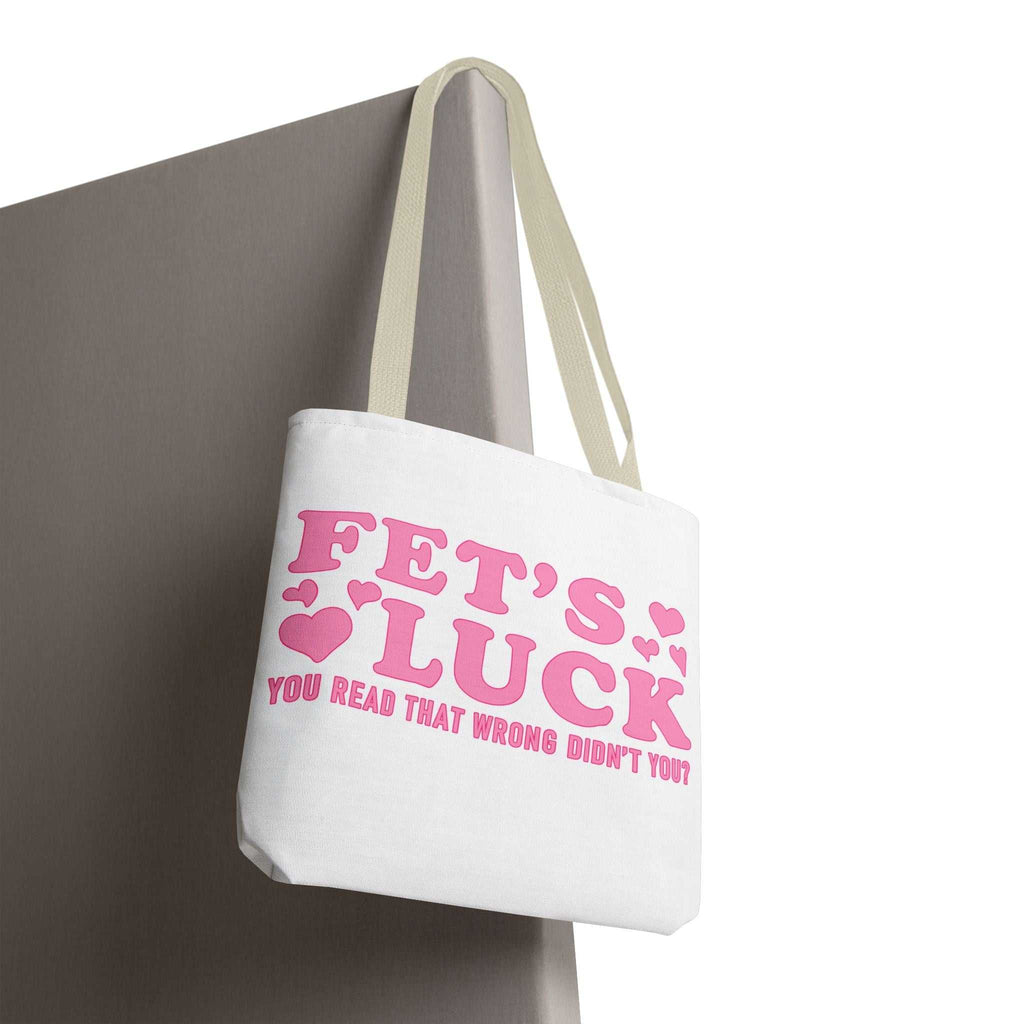 Pink heart tote bag with cheeky fun design and multiple handle color options