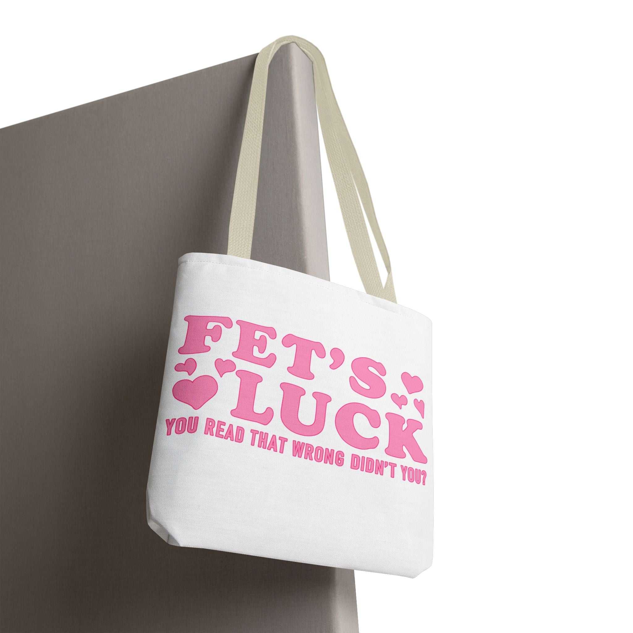 Pink heart tote bag with cheeky fun design and multiple handle color options