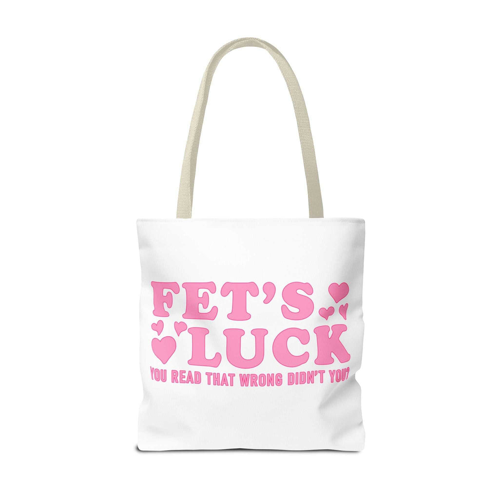 Pink heart tote bag with cheeky fun design, durable spun polyester, multiple handle colors, and three sizes for everyday use