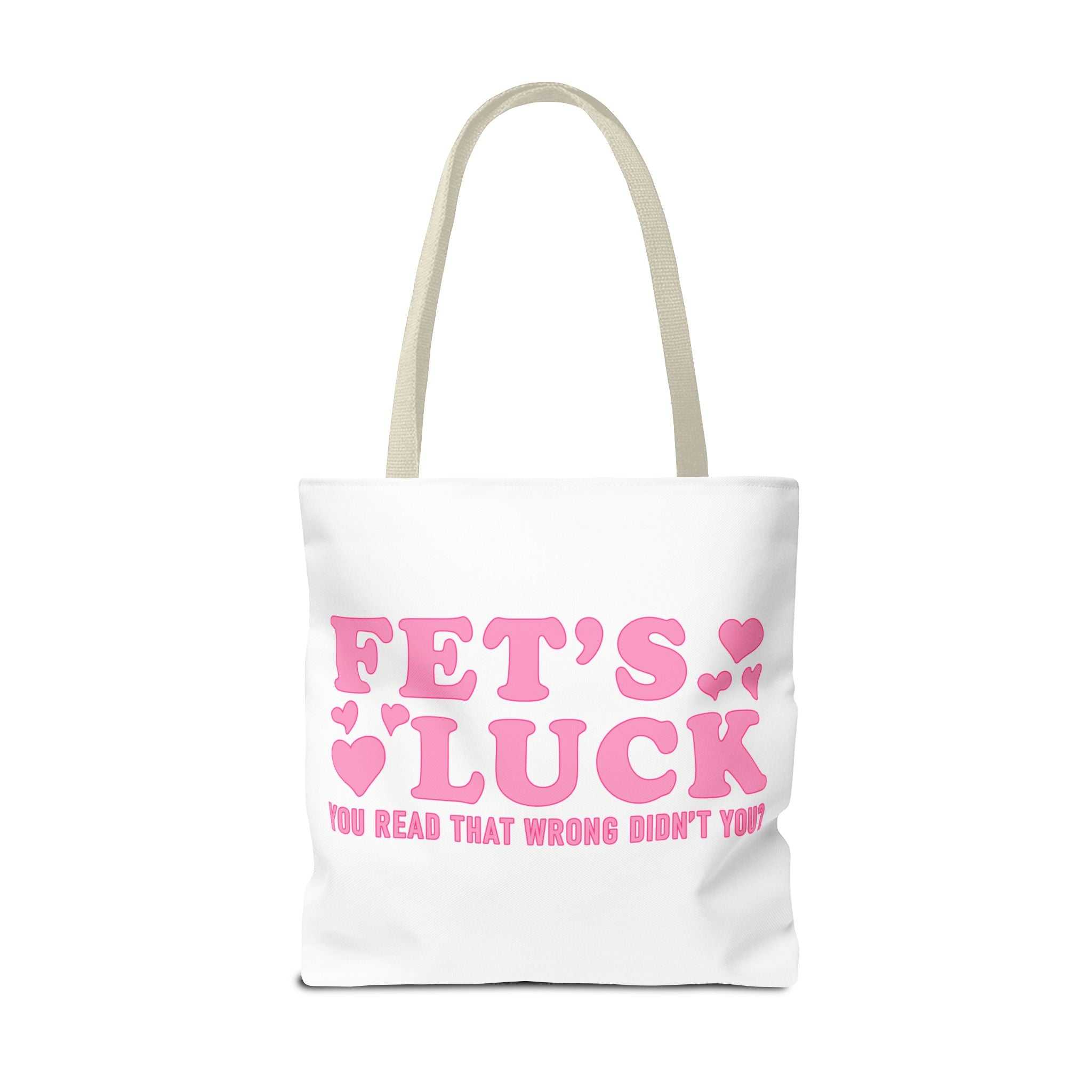 Pink heart tote bag with cheeky fun design, durable spun polyester, multiple handle colors, and three sizes for everyday use