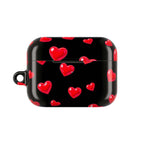 Black protective AirPods case with glossy red heart pattern, durable hard shell, lightweight and scratch-resistant design