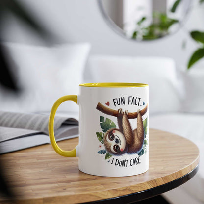 Cute sloth coffee mug with whimsical design and yellow handle.