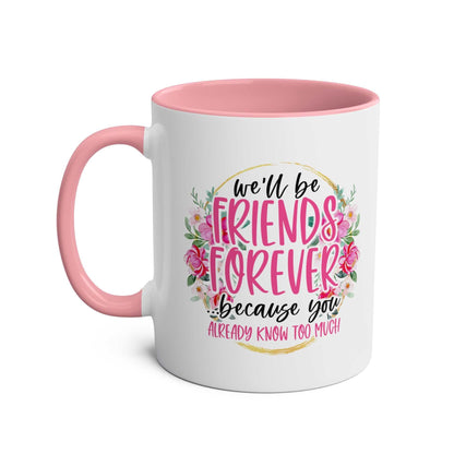 Pink and white Friends Forever coffee mug with floral design and humorous text.