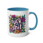 Cheeky "Fuck This Shit" coffee mug with colorful floral design and blue interior.