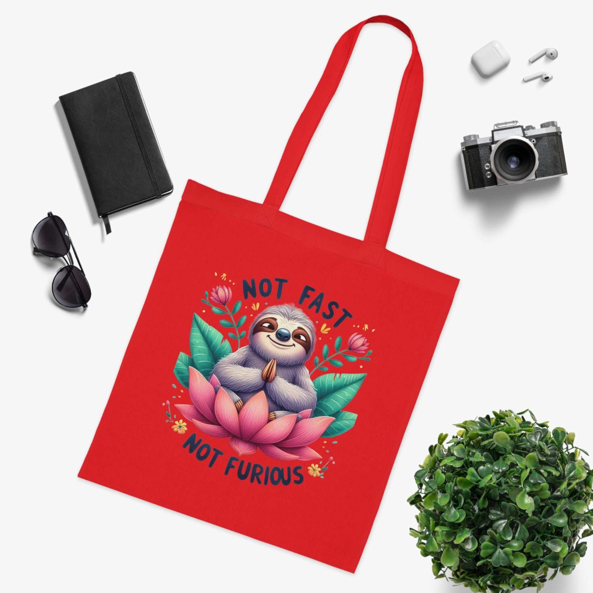 Cotton tote bag with cute sloth design, vibrant colors, 100% cotton fabric.