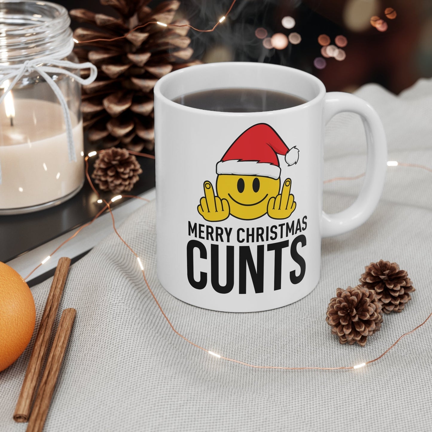 Funny Christmas mug with cheeky design featuring Santa emoji, perfect for festive humor.