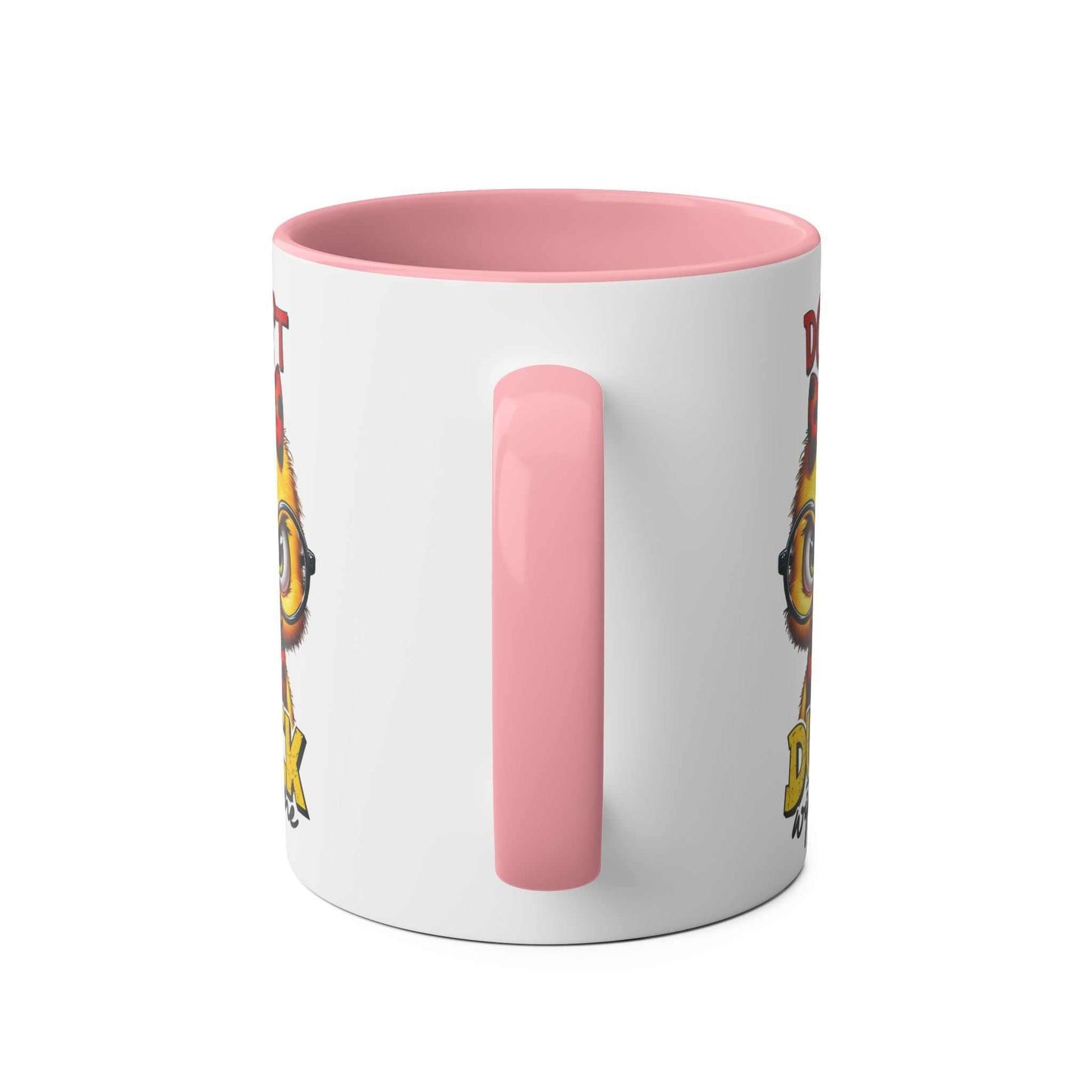 Don't Duck With Me coffee mug featuring fun duck design with pink handle and interior.