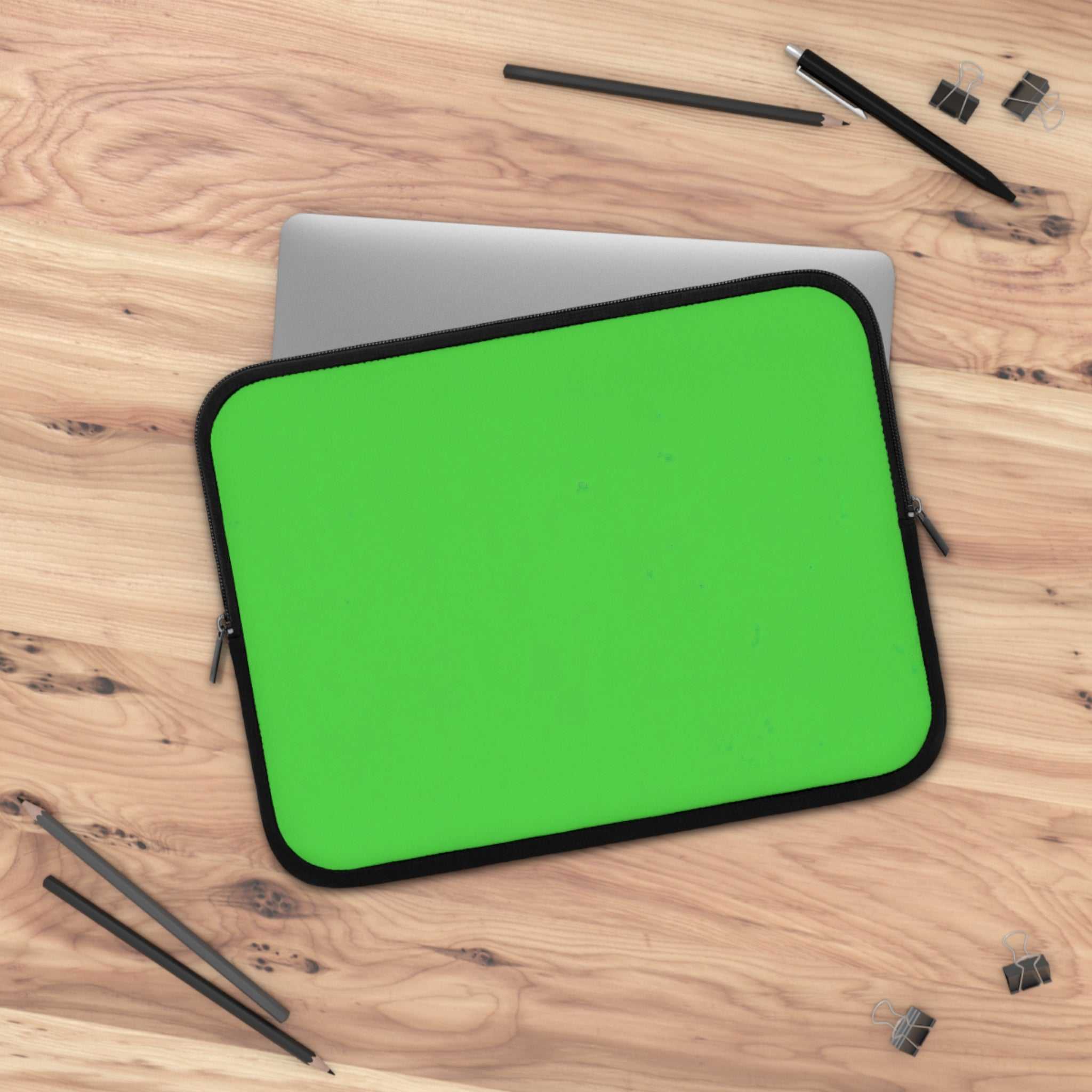 Lime green neoprene laptop sleeve with black trim and dual zipper, lightweight and protective for 13 to 17 inch laptops
