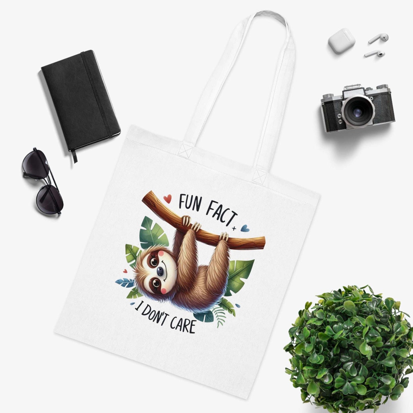 Cotton tote bag with cute sloth design, vibrant colors, and humorous quote; ideal for sloth lovers and everyday use.