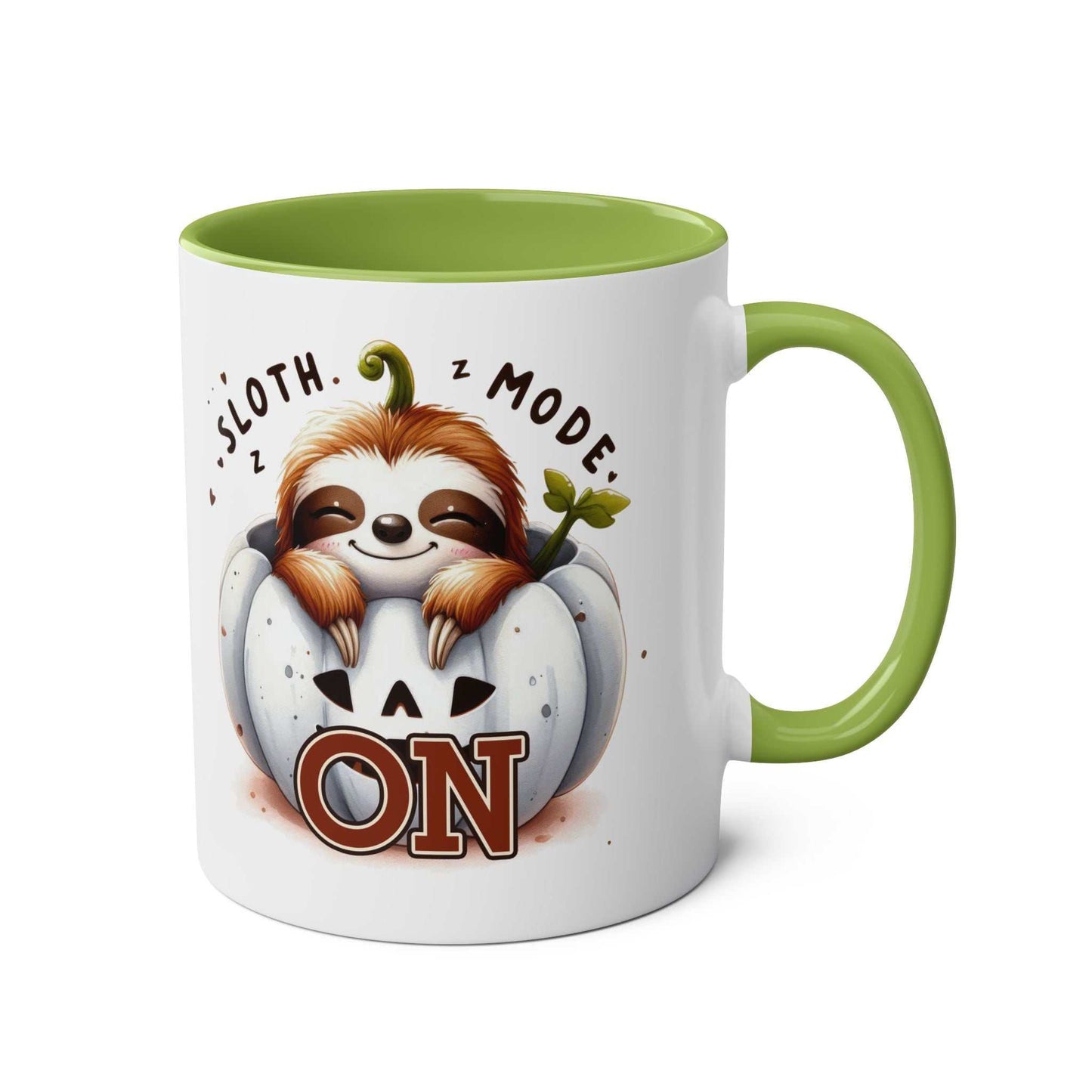 Cute sloth coffee mug with green handle and interior, featuring a cheerful sloth illustration and "Sloth Mode ON" text.