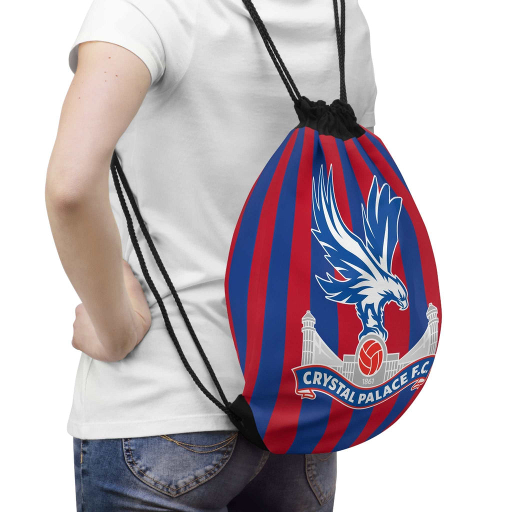 Crystal Palace Fc drawstring bag in red and blue with eagle crest, lightweight polyester, roomy and durable for gym or casual use