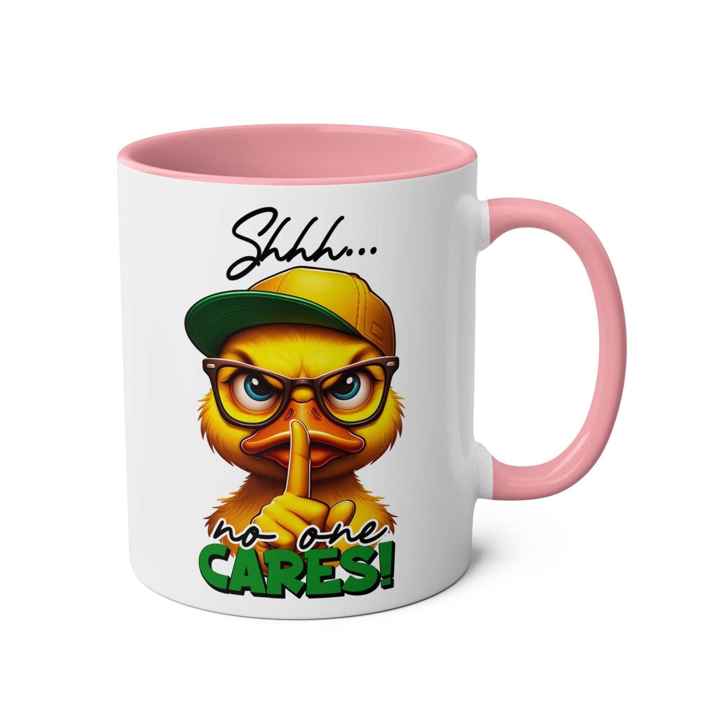 Sarky duck coffee mug with "Shhh... no one cares" message, pink handle.