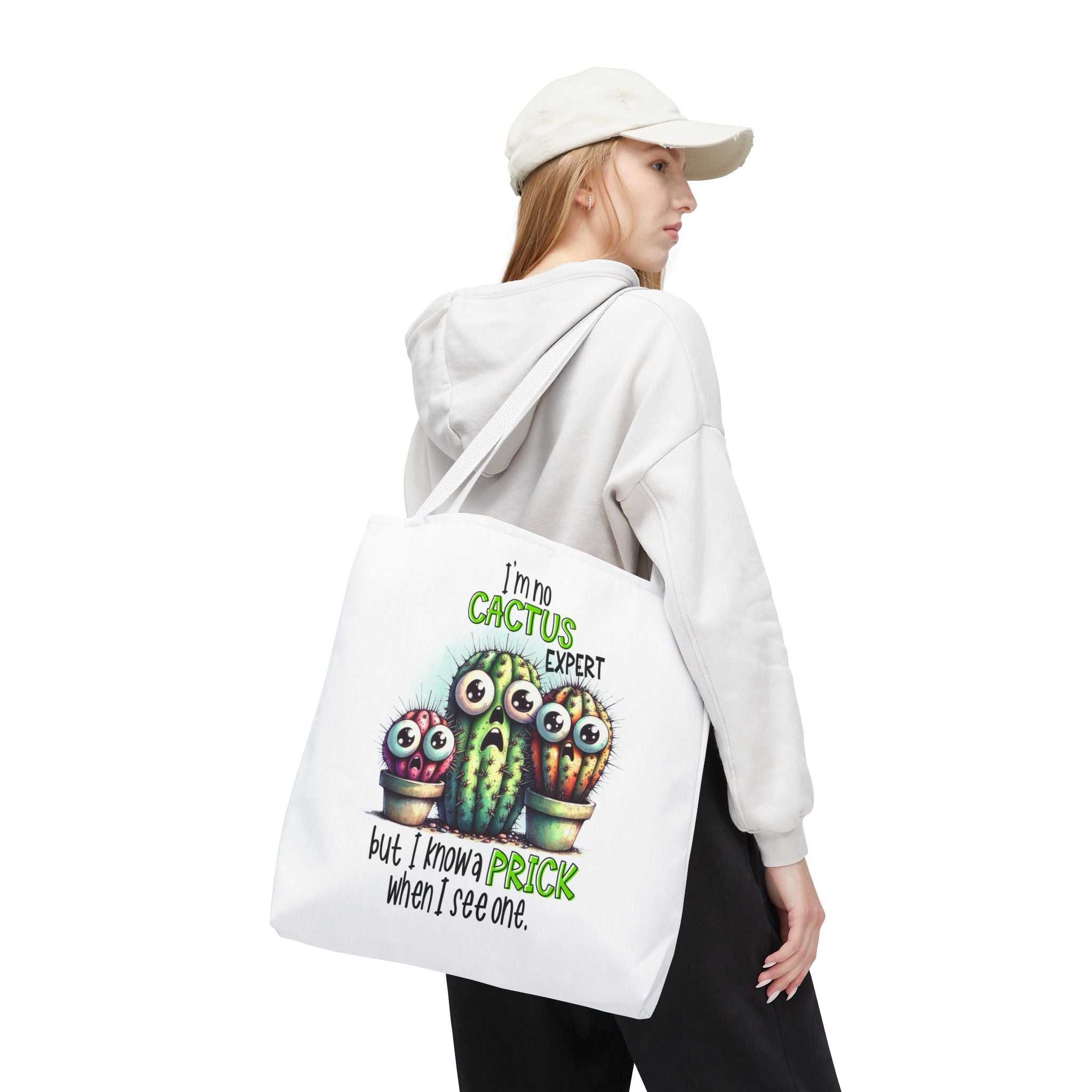 Fun cactus tote bag with cheeky printed design and colorful handles