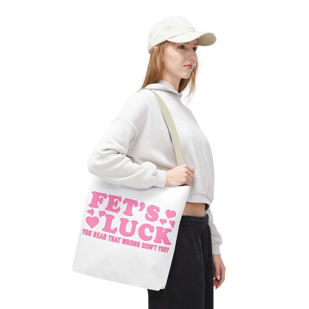 Pink heart tote bag with cheeky fun design and multiple handle color options