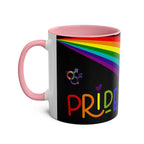 LGBTQ+ Pride Mug with rainbow design and pink handle.
