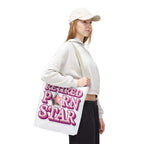 Cheeky Retired Porn Star Tote Bag with playful design, durable spun polyester, multiple sizes and handle colors