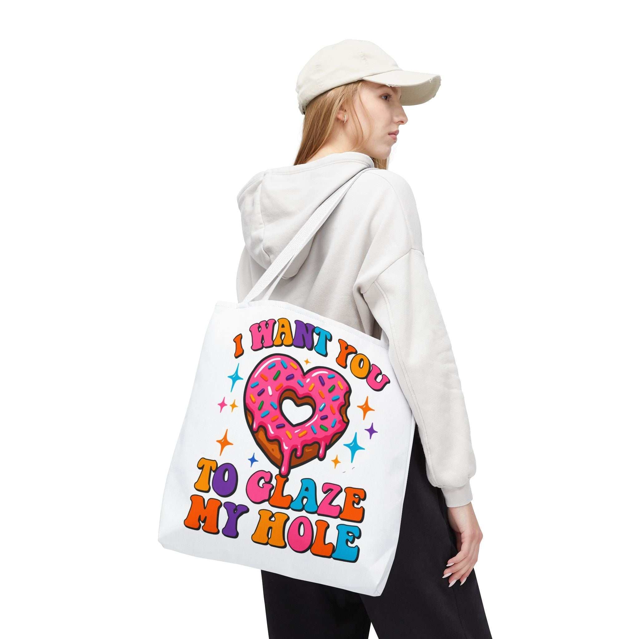 Glaze My Hole Donut Tote Bag with cheeky donut design and colorful handles, made of durable spun polyester