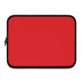Red neoprene laptop sleeve with soft foam lining and dual zipper for protection and easy access
