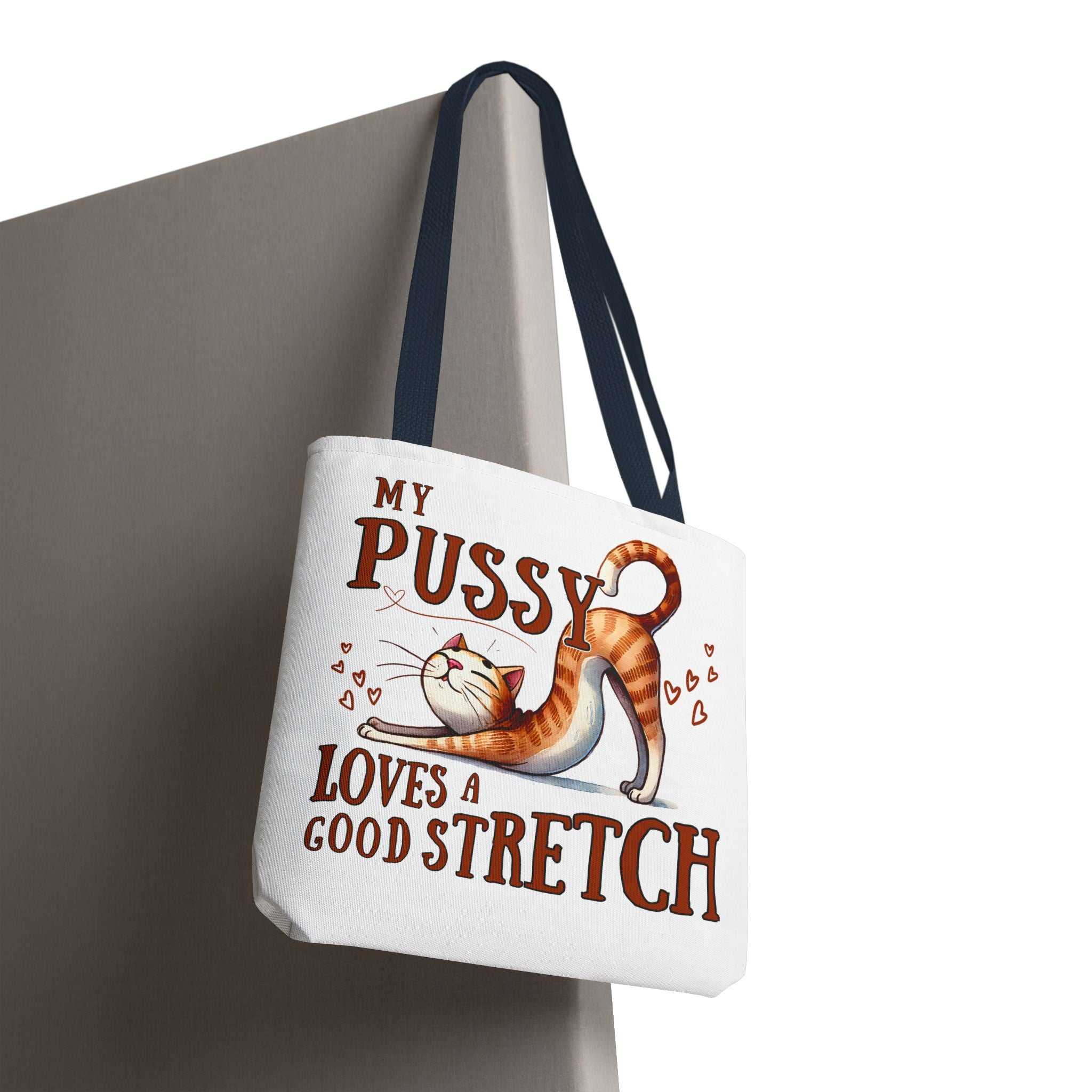 Fun stretching cat tote bag with cheeky design and colorful handles