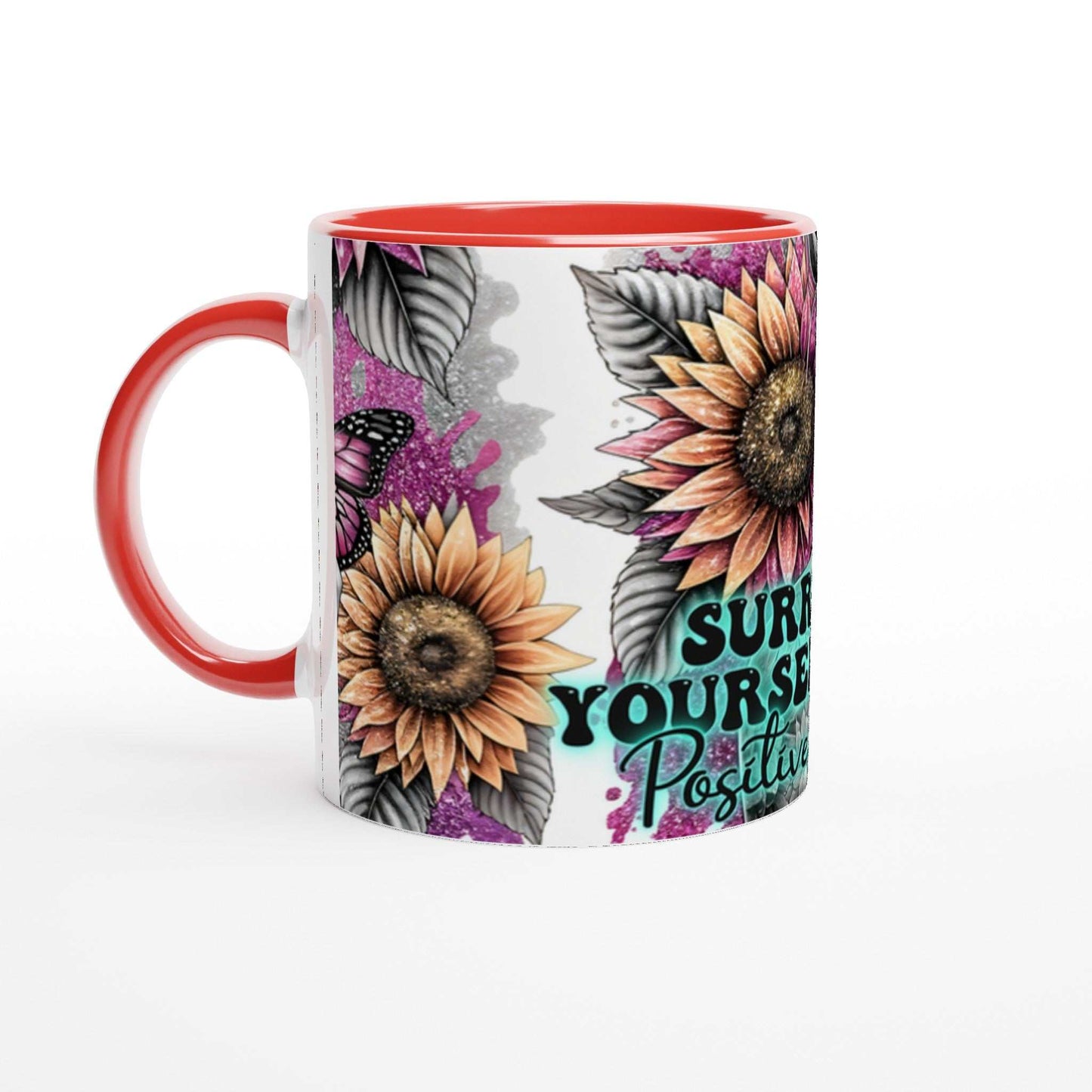 Positive Vibes motivational coffee mug with colorful sunflower design and red handle.