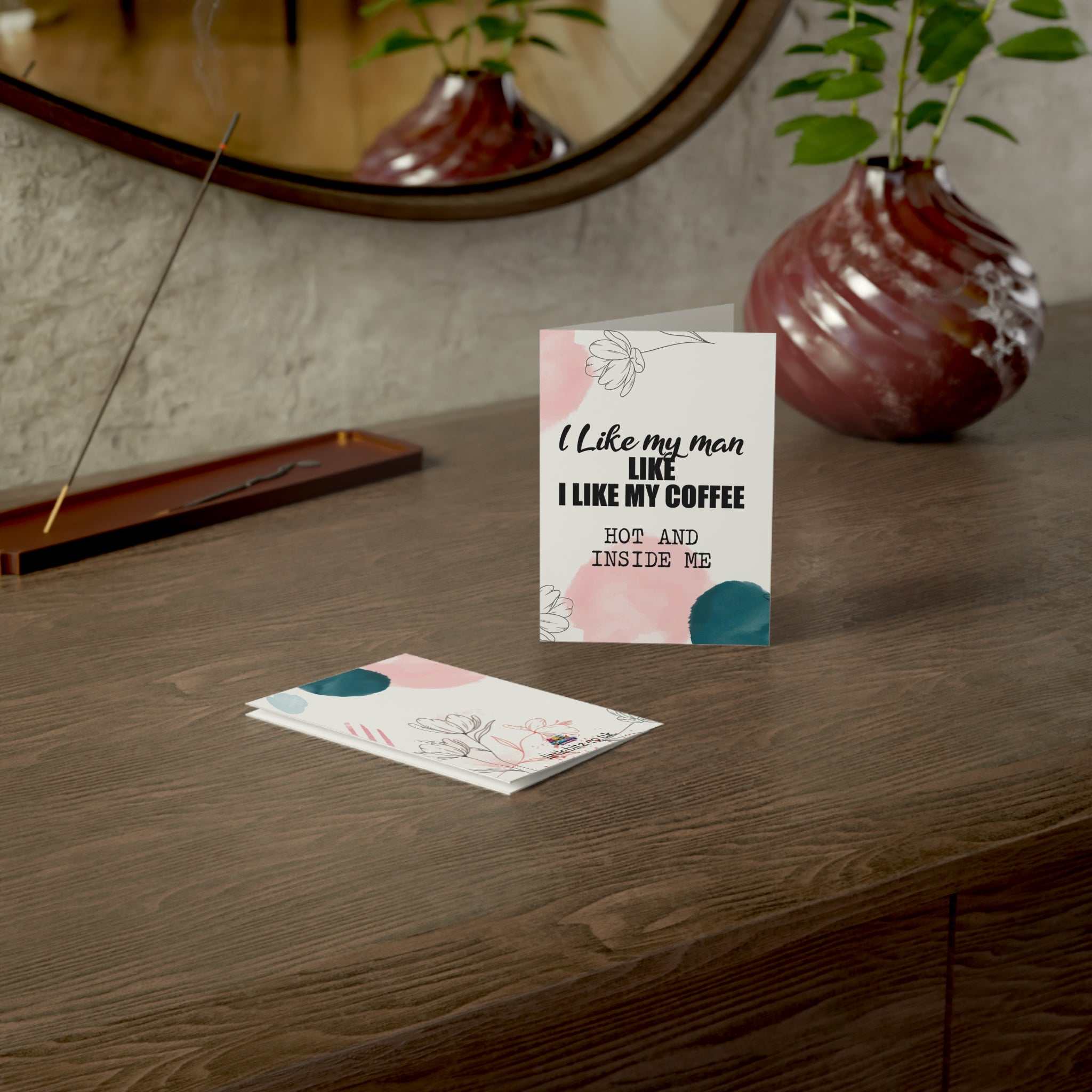 Cheeky Fun Greeting Card with playful design on a wooden table, A6 size with envelope included.