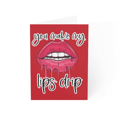 Red greeting card with dripping lips design and "You Make My Lips Drip" text.