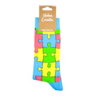 Colorful puzzle piece design on Jigsaw Socks, made with premium cotton.