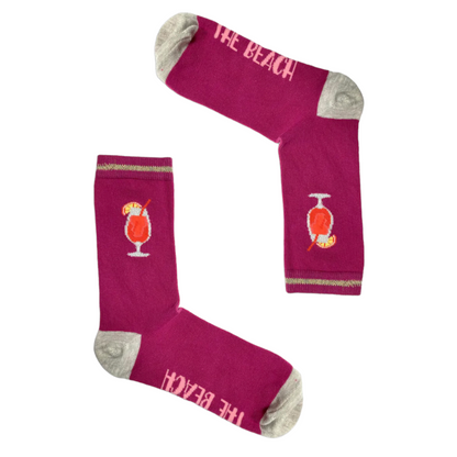 Colorful cocktail-themed socks from the Socktails Gift Set, featuring vibrant designs and novelty text.