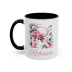 Personalised watercolour gift mug with floral initial R and name Rebecca, black handle and rim, glossy finish.