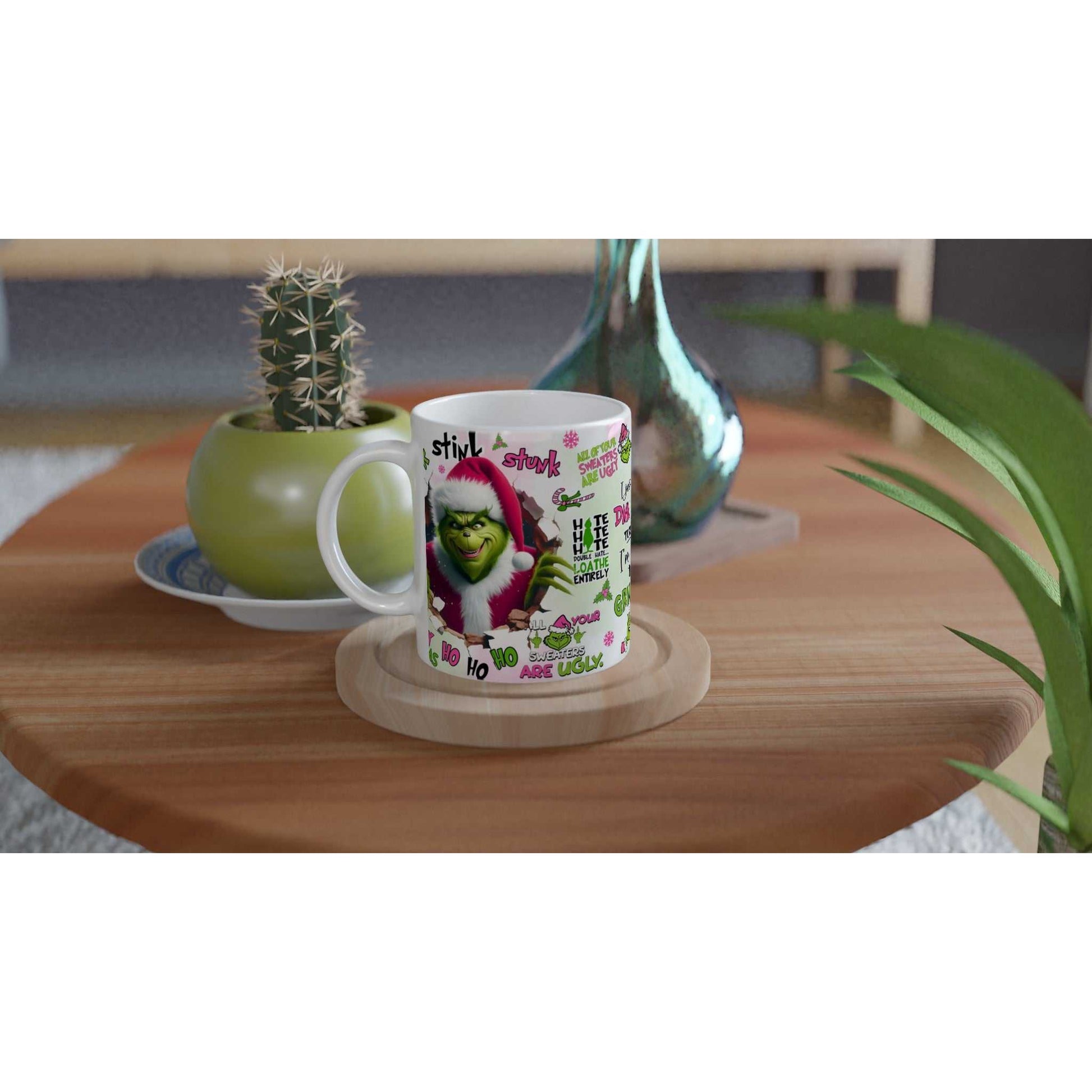 Grinch Christmas Mug with glossy finish and iconic character design on wooden table.