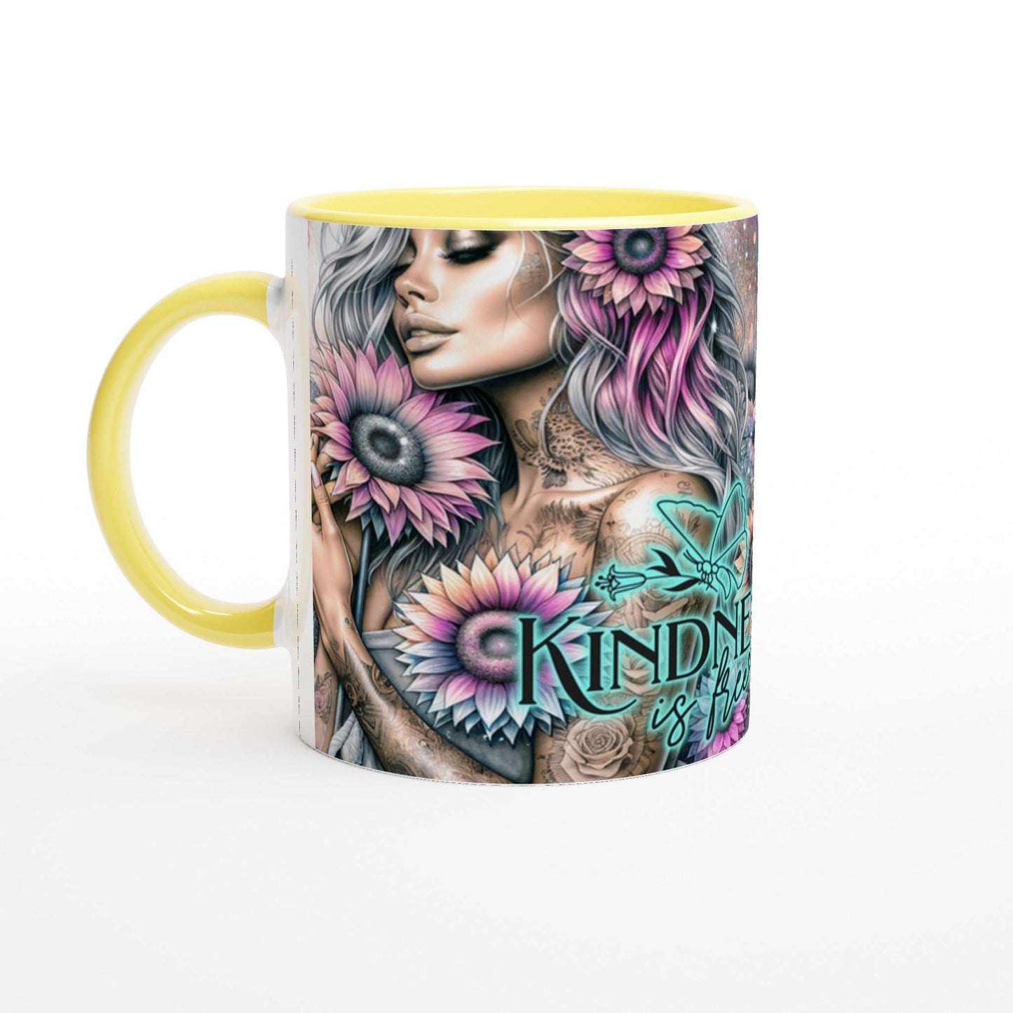 Inspirational "Kindness Is Free" ceramic coffee mug with colorful floral design and yellow handle, 11oz.