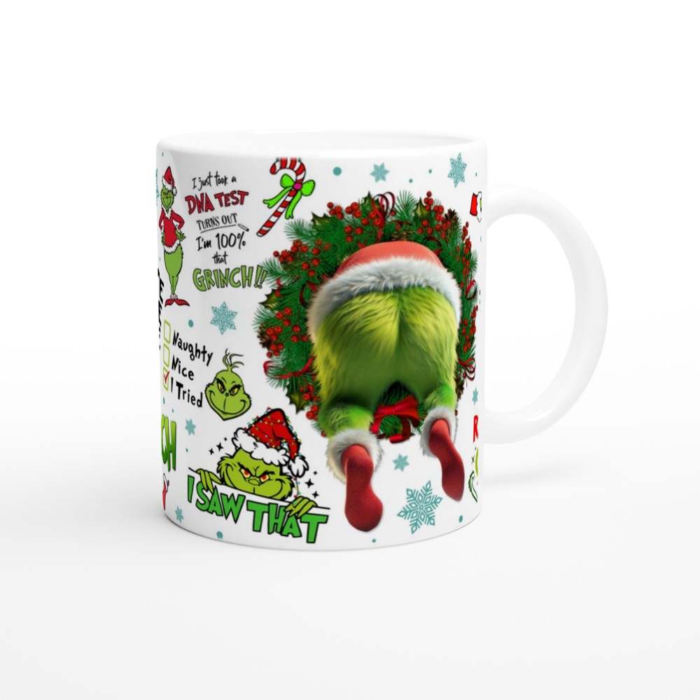 Grinch Christmas Mug with festive design on red backdrop, 11oz ceramic, glossy finish, microwave and dishwasher safe.
