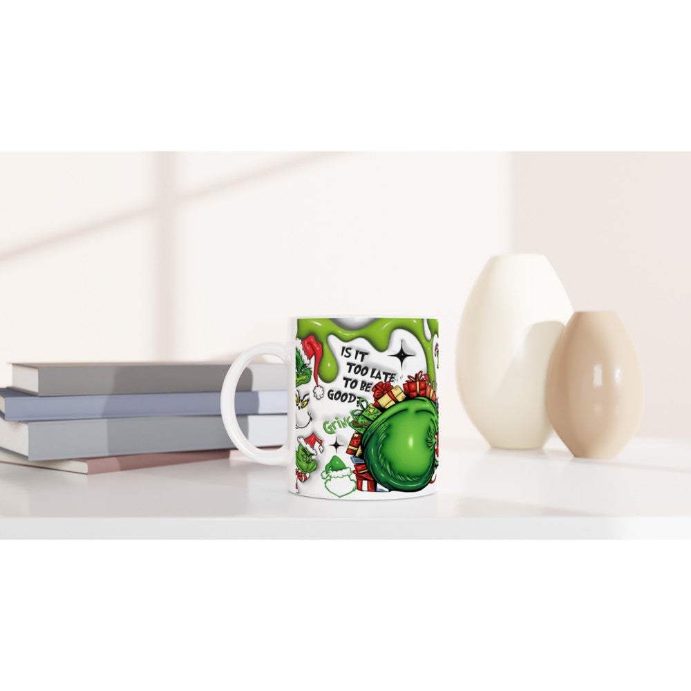 Fun Grinch Christmas Mug featuring festive design on white ceramic background.