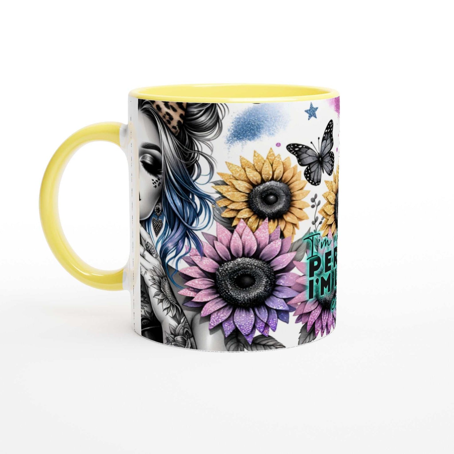 I'm Not Perfect motivational coffee mug with colorful floral design and yellow handle.